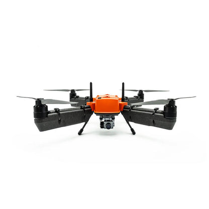 Waterproof SwellPro fishing drone floating on water surface